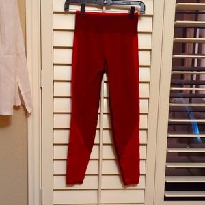 Victoria's Secret seamless leggings size extra small redish color. Worn Once !!